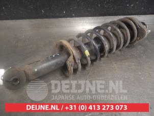 Mitsubishi Lancer Rear shock absorber rod, left O561373 photo 2