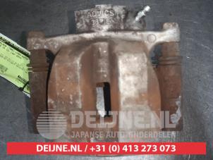 Lexus IS Remklauw (Tang) links-achter O561700 foto 2
