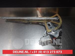 Toyota Avensis Verso Window mechanism 4-door, front left O276056 photo 2
