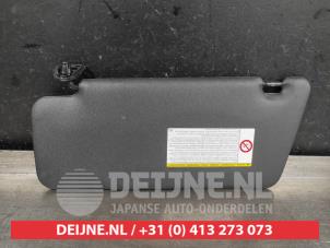Daihatsu Materia Zonneklep O563299 foto 2