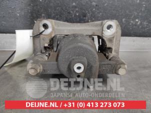 Mazda 2 Bremszange links vorne O563845 foto 2