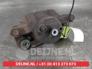 Toyota Yaris Front brake calliper, left O564369 photo 3