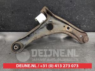 Toyota Yaris Front lower wishbone, left O564371 photo 2