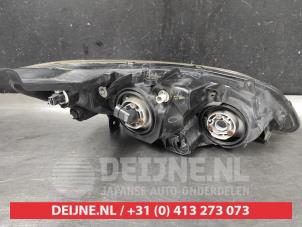 Honda Civic IMA Scheinwerfer links O564533 foto 2