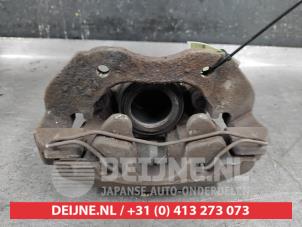 Mazda 5 Front brake calliper, right O564647 photo 2