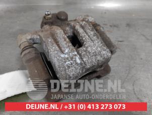 Kia Sportage Rear brake calliper, left O564961 photo 2