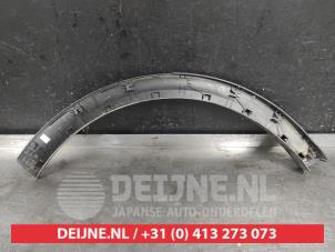 Kia Sportage Spatbordverbreder O565212 foto 2