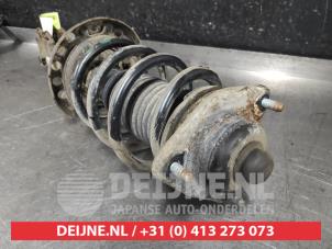 Kia Carens Stoßdämpferstrebe links vorne O565370 foto 2