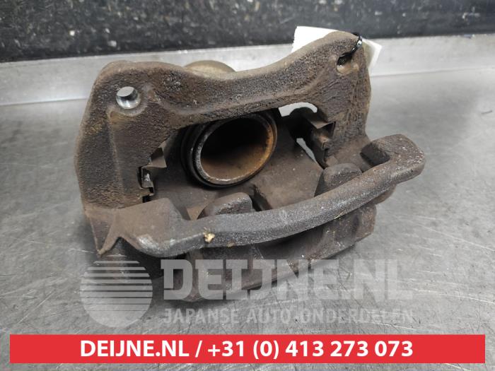 Kia Carens Remklauw (Tang) links-voor O565384