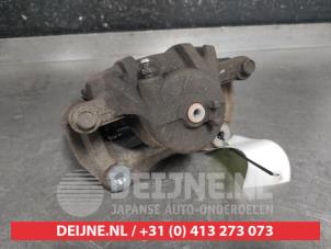 Kia Carens Bremszange links vorne O565384 foto 3