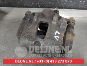 Kia Carens Bremszange links vorne O565384 foto 2