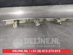 Nissan Leaf Front bumper strip, left O565835 photo 2