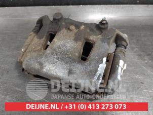 Nissan Leaf Remklauw (Tang) links-voor O565863 foto 2