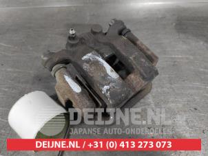 Nissan Leaf Remklauw (Tang) links-achter O565865 foto 2