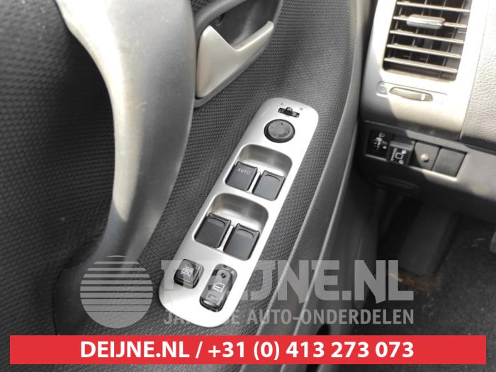 Suzuki Liana Multi-functional window switch O566078