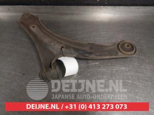 Suzuki Liana Draagarm onder links-voor O566257 foto 2