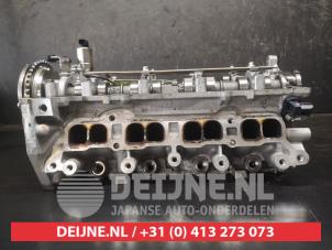 Mazda 2 Cylinder head O566412 photo 2