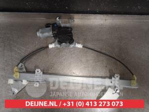Nissan Note Fenstermechanik 4-türig links vorne O567470 foto 2