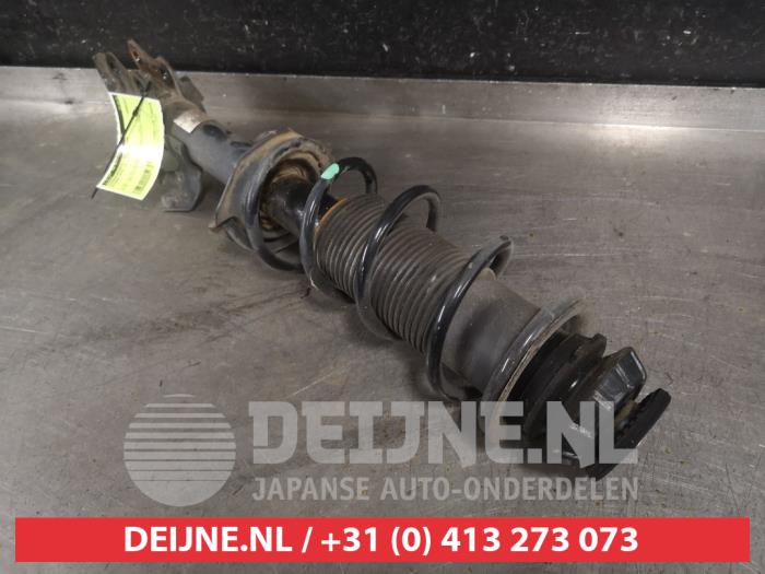 Nissan Note Schokdemperpoot rechts-voor O567740