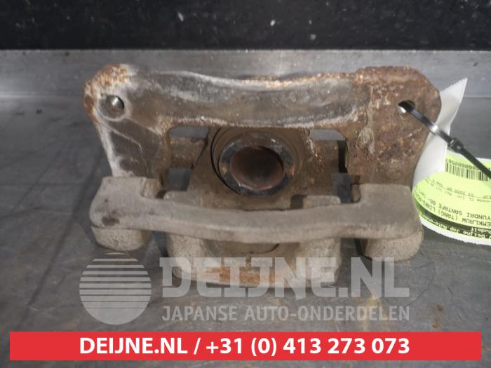 Hyundai Santafe Bremszange links hinten O567947
