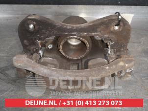 Hyundai Matrix Front brake calliper, left O568430 photo 3