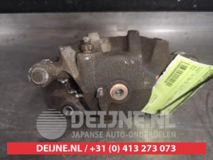 Hyundai Matrix Front brake calliper, left O568430 photo 2