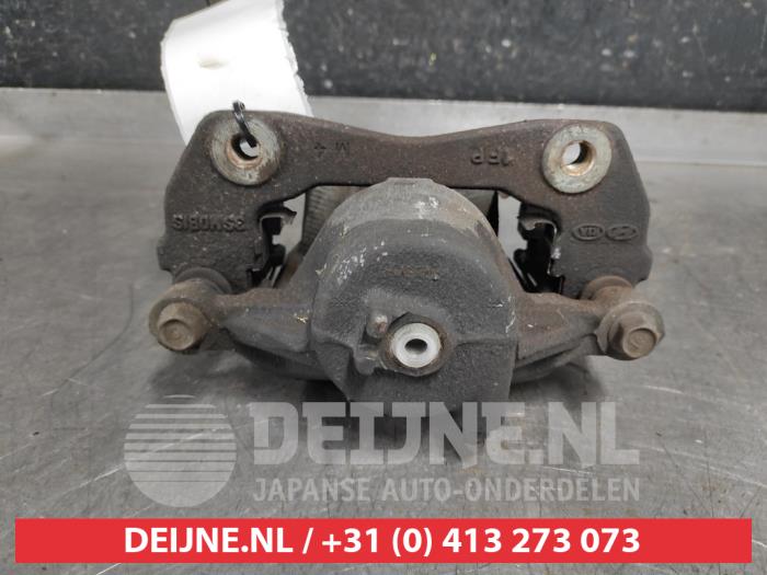 Hyundai IX20 Bremszange links vorne O569171