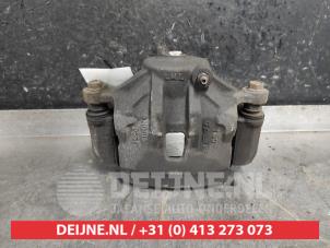 Hyundai IX20 Bremszange links vorne O569171 foto 3