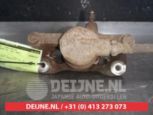 Mitsubishi Lancer Remklauw (Tang) links-achter O569544 foto 2