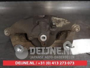 Mazda 3 Front brake calliper, right O569600 photo 2