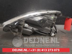 Nissan Micra Scheinwerfer links O570434 foto 2