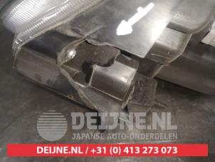 Nissan Micra Scheinwerfer links O570434 foto 3