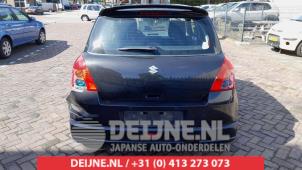 Suzuki Swift Bumperdeel midden-achter O570435 foto 3
