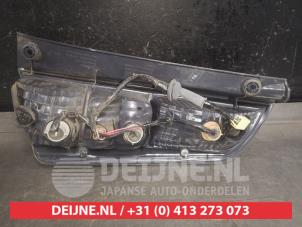 Daihatsu Sirion Achterlicht links O570439 foto 2