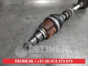 Nissan Micra Antriebswelle links vorne O571337 foto 2