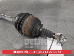Nissan Micra Antriebswelle links vorne O571337 foto 3