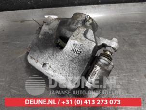 Hyundai Kona Bremszange links vorne O571383 foto 2
