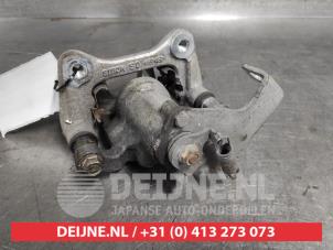 Hyundai Kona Bremszange rechts hinten O571386 foto 3
