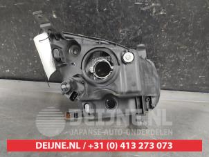 Subaru Justy Scheinwerfer links O571869 foto 2