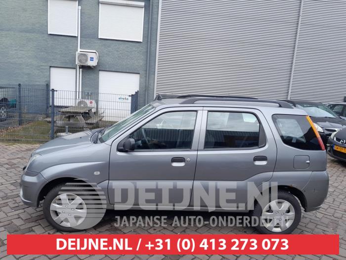 Subaru Justy Tür 4-türig links hinten O571880