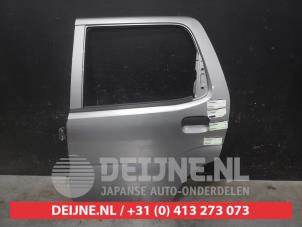 Subaru Justy Portier 4Deurs links-achter O571880 foto 2