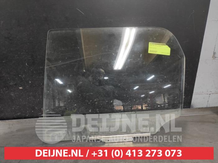 Subaru Justy Türscheibe 4-türig links hinten O571881