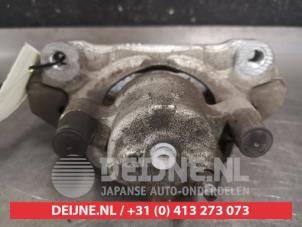 Toyota Aygo X Bremszange links vorne O572208 foto 2