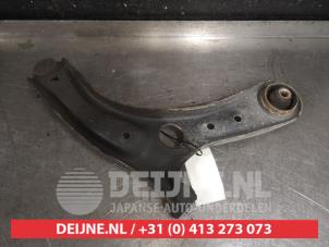 Kia Rio Querlenker unten links vorne O572680 foto 2