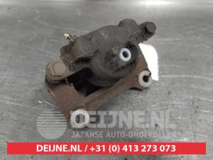 Suzuki Ignis Remklauw (Tang) links-voor O574279 foto 3