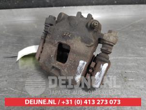 Suzuki Ignis Remklauw (Tang) links-voor O574279 foto 2