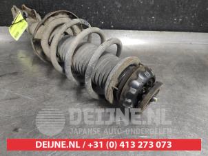 Kia Rio Schokdemperpoot rechts-voor O574443 foto 2