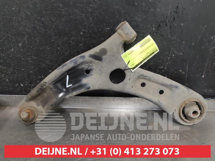 Kia Rio Draagarm onder links-voor O574448