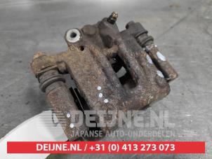 Toyota Corolla Rear brake calliper, left O574693 photo 2