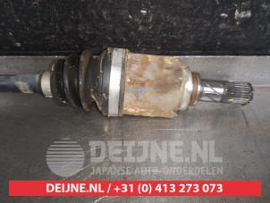 Nissan Note Aandrijfas rechts-voor O576737 foto 3